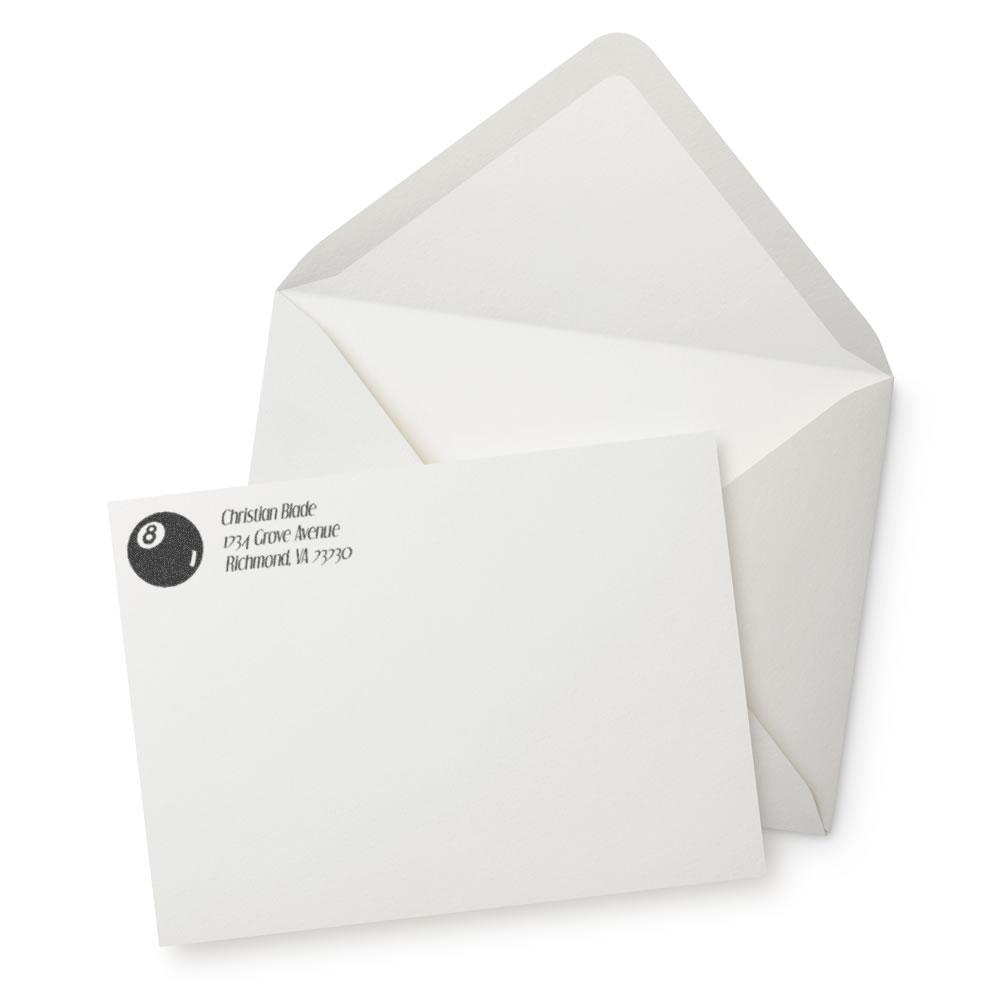 Custom return address rubber stamp on envelope and stationery for professional mailing and branding