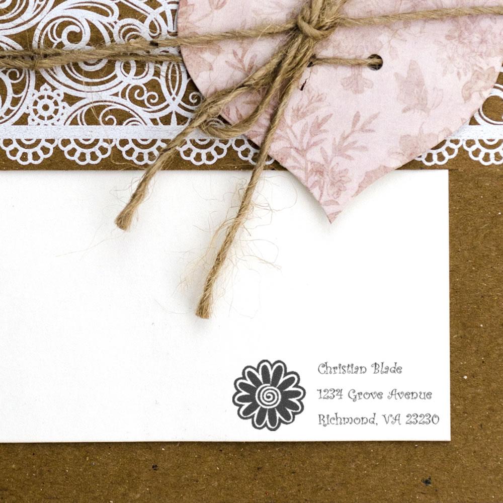 Personalized return address rubber stamp with floral icon on envelope, perfect for wedding invitations and stationery