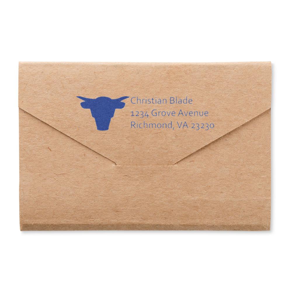 Custom return address rubber stamp with logo on kraft envelope for business mailings.