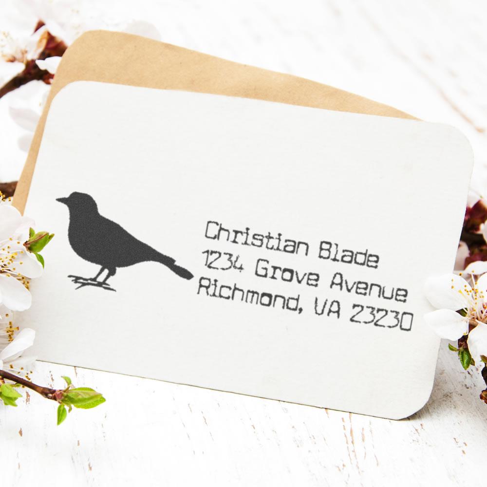 Custom bird return address rubber stamp for personalized envelopes, featuring name and Richmond, VA mailing address.