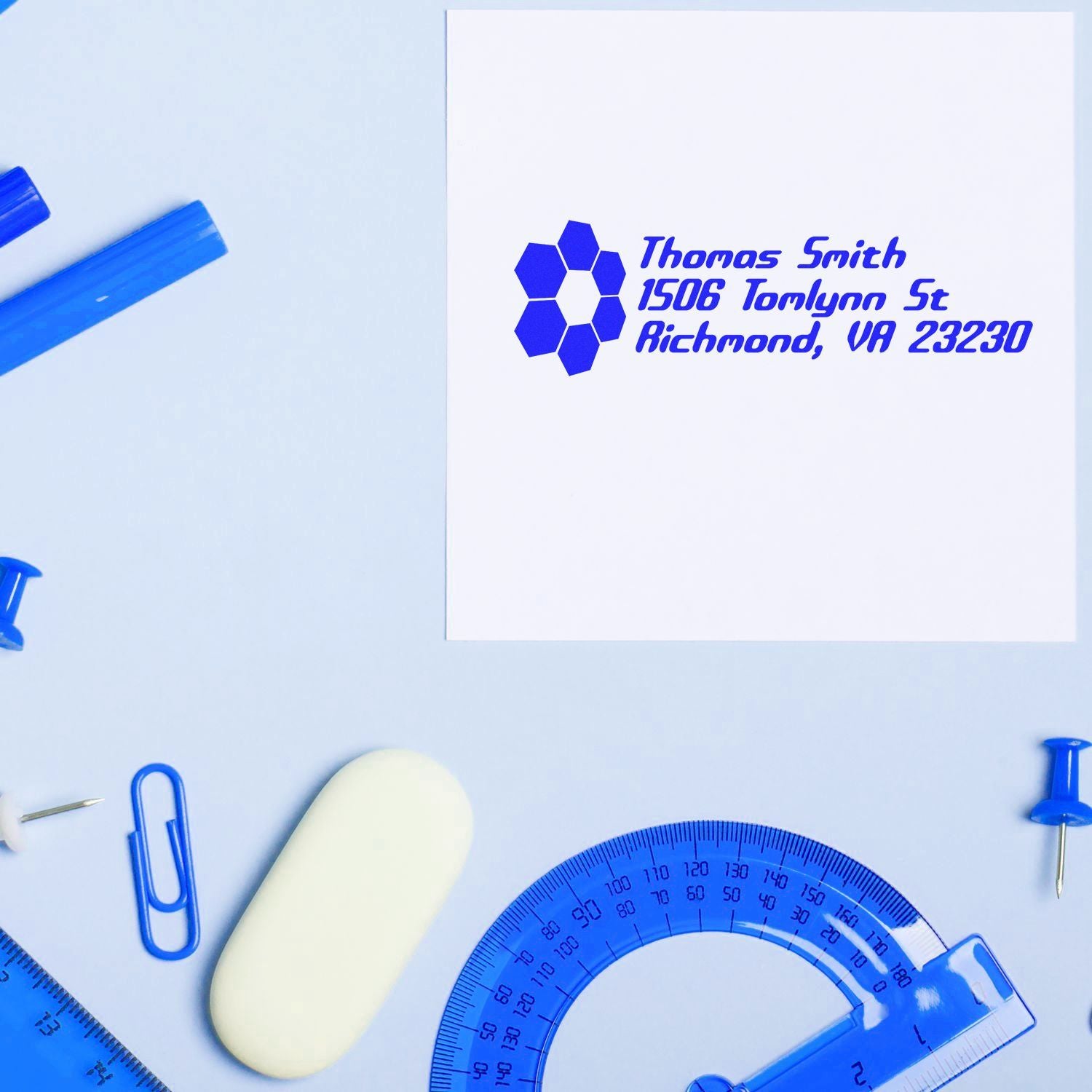 Custom blue address rubber stamp imprint on white paper, featuring name, street address, and Richmond, VA mailing details.