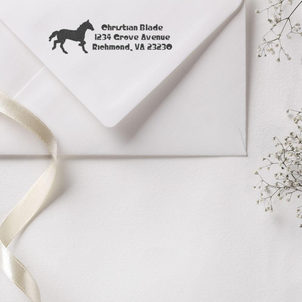 Custom horse return address rubber stamp on white envelope with horse silhouette, Christian Blade, Richmond, VA address.