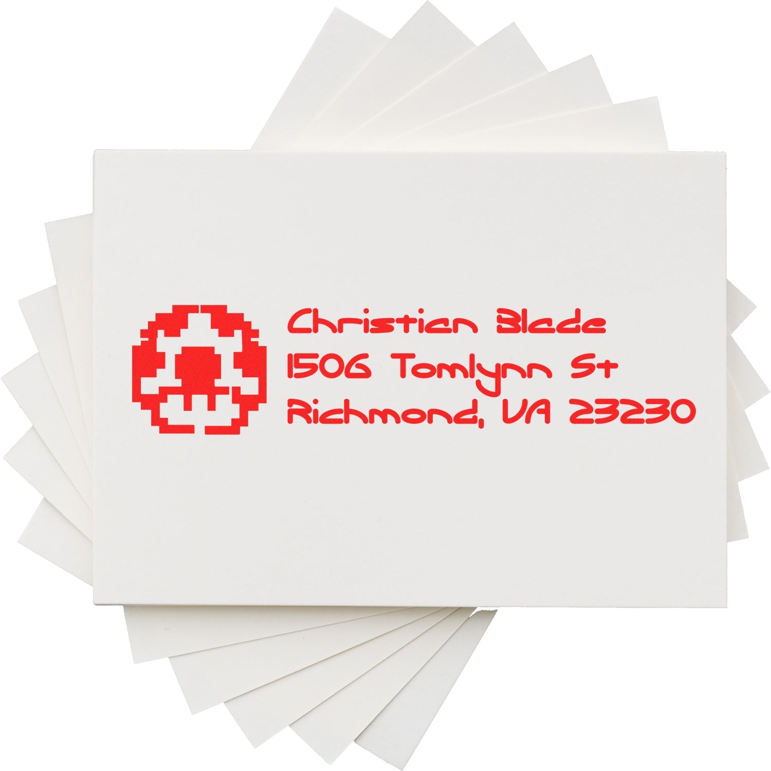 Custom return address rubber stamp on envelopes with red logo, name, and Richmond, VA address.