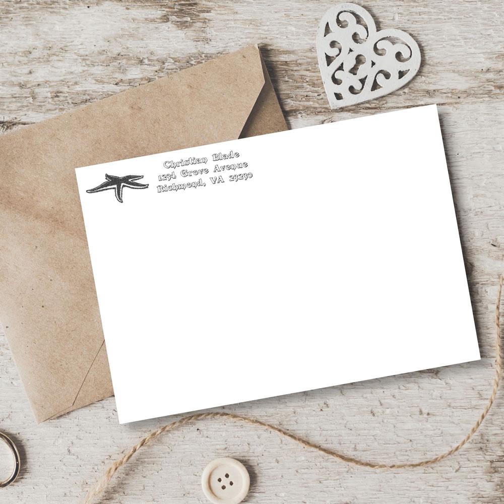 Custom return address rubber stamp on envelope, ideal for personalized stationery, wedding invitations, and business mail.