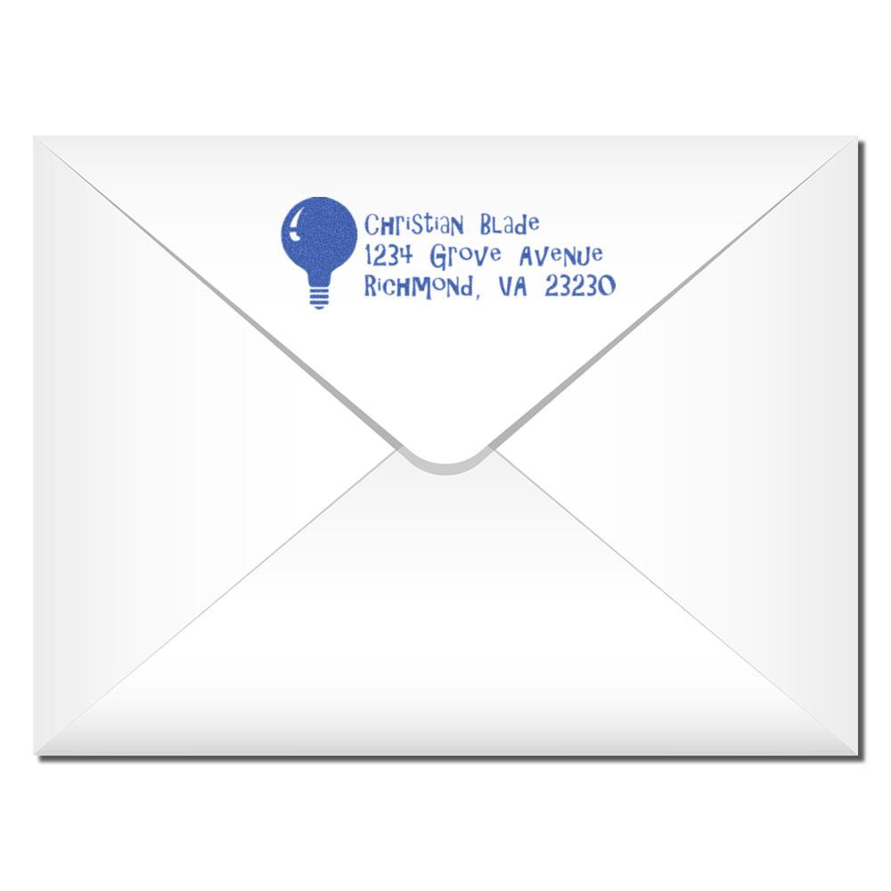 Custom return address rubber stamp on envelope with logo, name, and Richmond, VA address for Christian Blade.