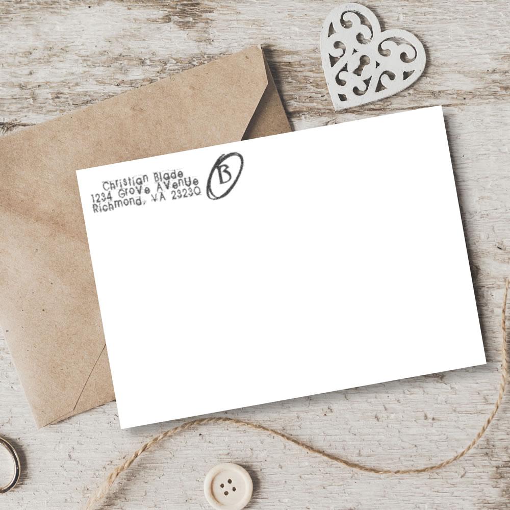 Custom return address rubber stamp on envelope, ideal for personalized mailing and wedding stationery.