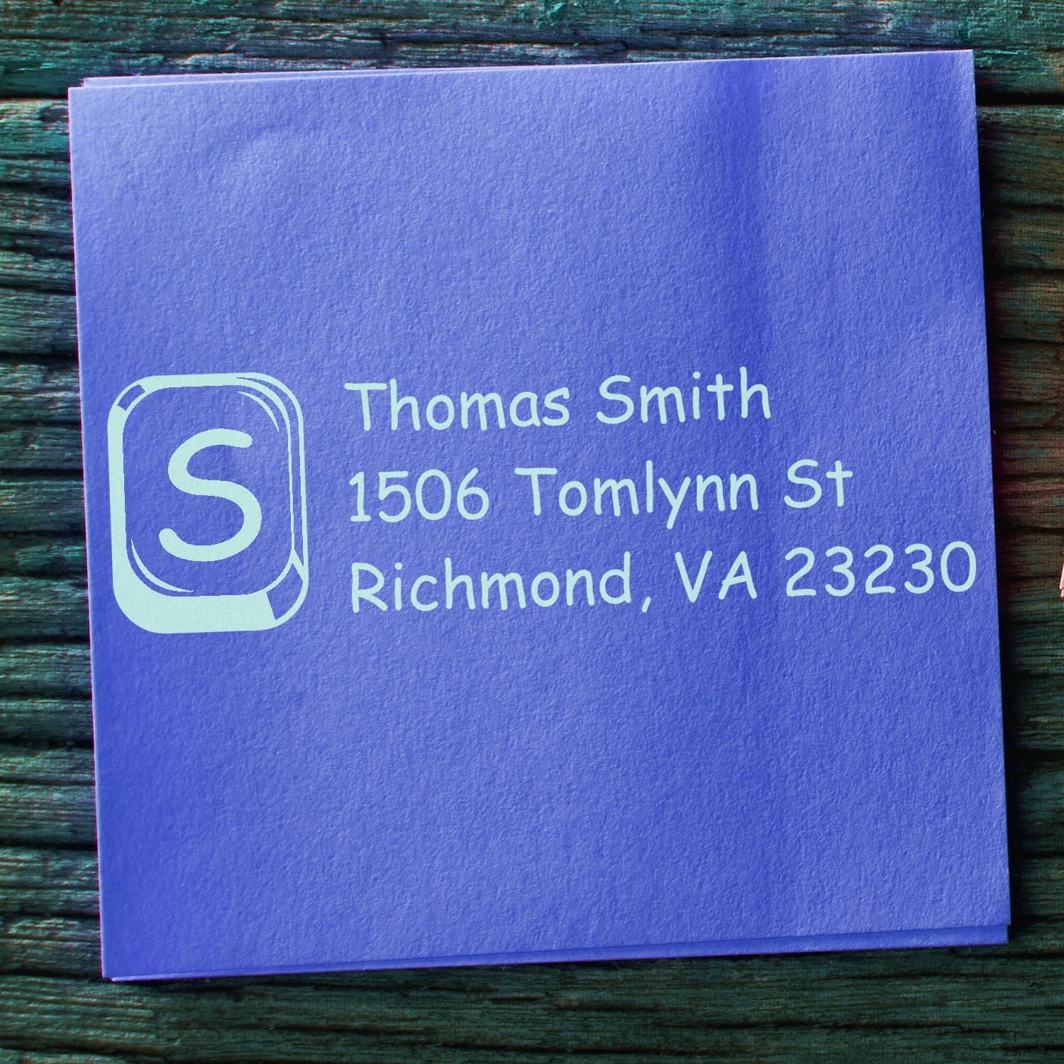 Personalized address rubber stamp with monogram S for Thomas Smith, Richmond, VA, on purple cardstock.
