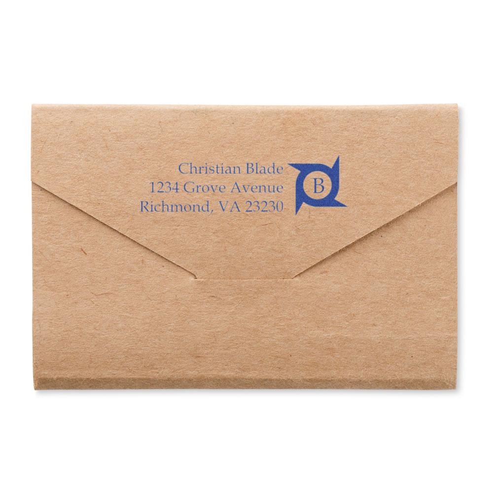 Custom return address rubber stamp on kraft envelope for Christian Blade, 1234 Grove Avenue, Richmond, VA, with monogram.