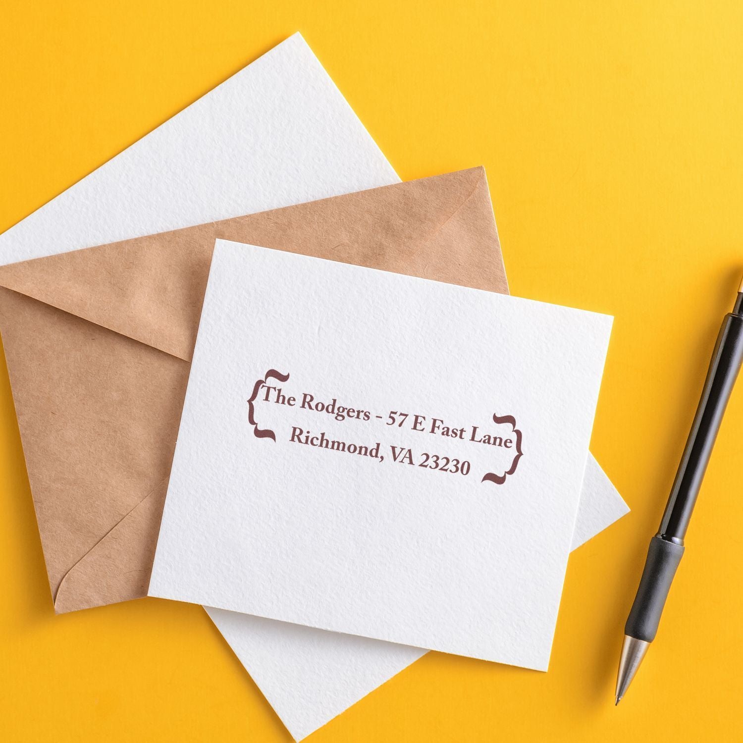 Custom return address rubber stamp on envelopes for mailing invitations and small business correspondence.