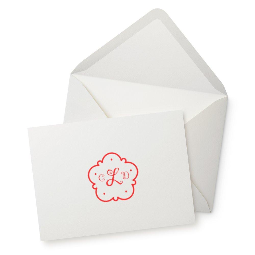 Custom monogram rubber stamp for wedding invitations, sealing envelopes and personalized stationery with a decorative red initial.