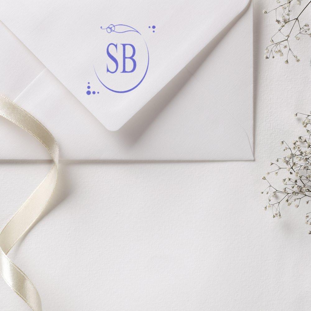 Custom monogram rubber stamp on wedding envelope with elegant SB design for personalized stationery and invitations