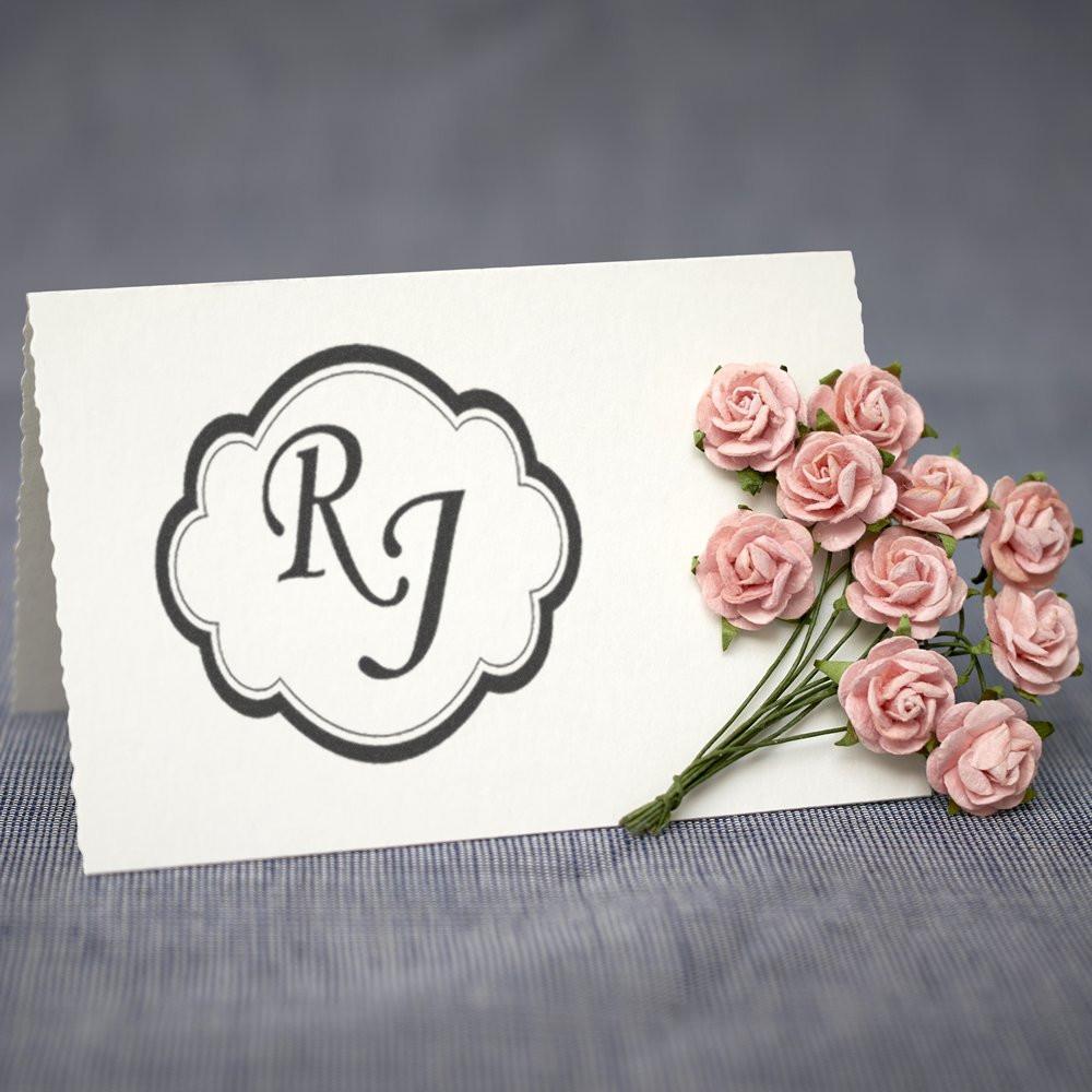 Custom RJ monogram rubber stamp with scalloped frame for wedding invitations, stationery, or personal branding.