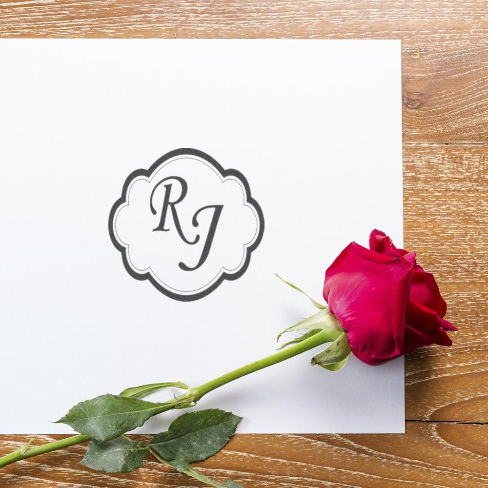 Personalized RJ monogram rubber stamp for wedding invitations, ideal for custom stationery and gift packaging.