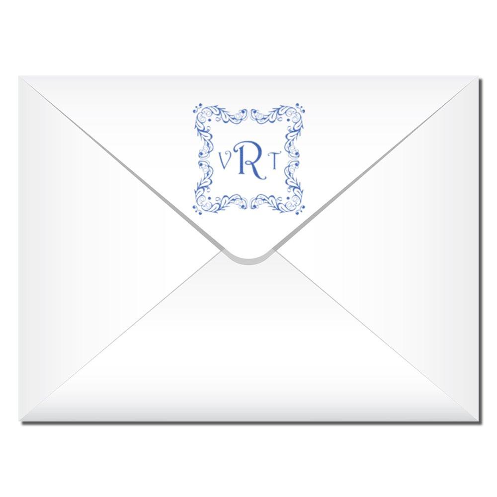 Custom monogram rubber stamp on envelope seal with ornate blue VRT initials for wedding invitations and stationery