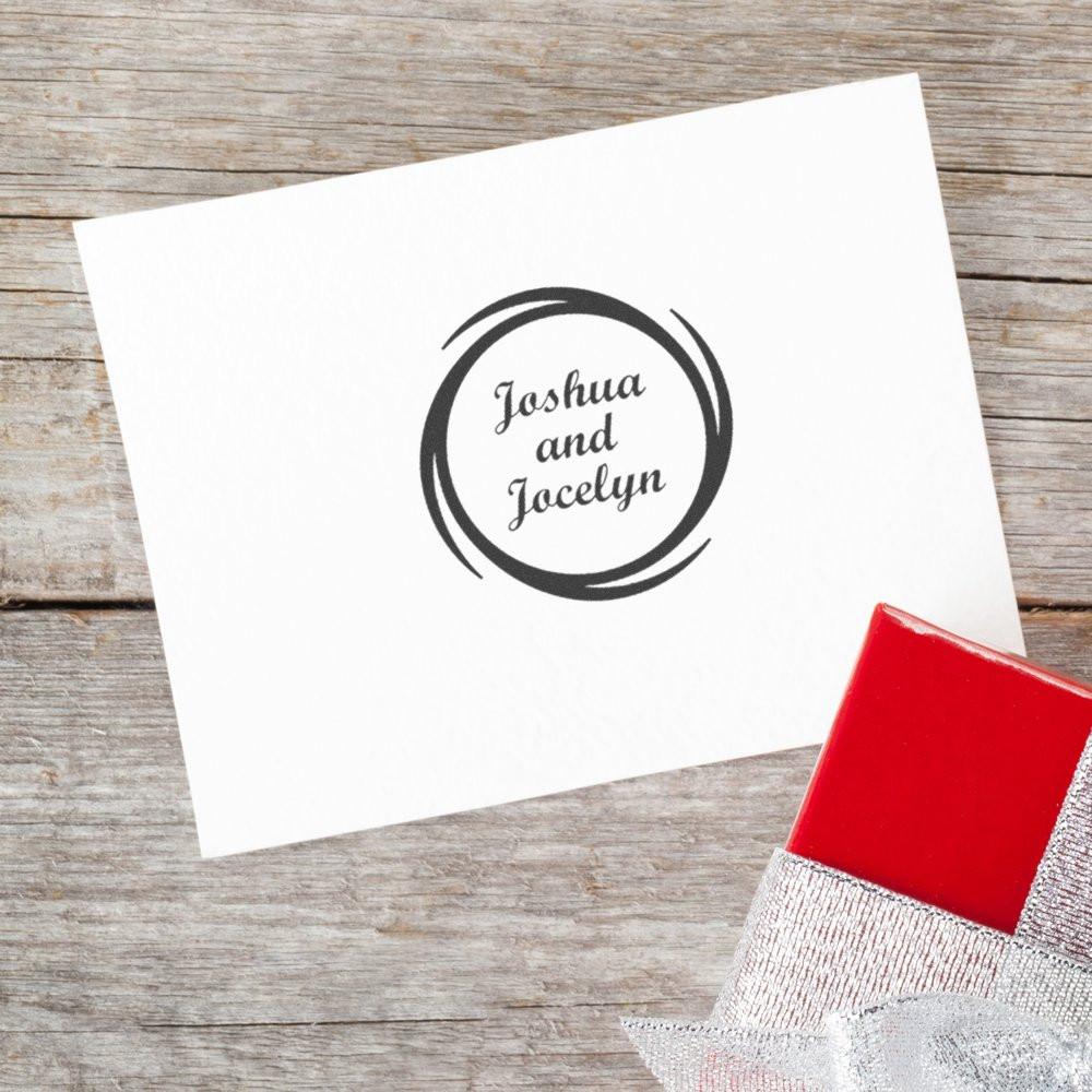 Personalized rubber stamp for Joshua and Jocelyn wedding invitations, shown stamped on card with red ink pad.