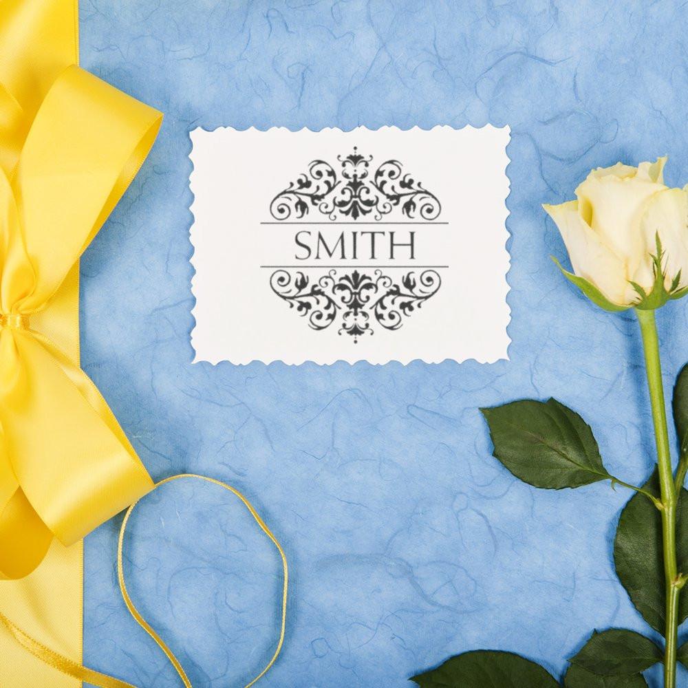 Custom Smith rubber stamp with ornate monogram, ideal for wedding invitations, stationery, and elegant branding.