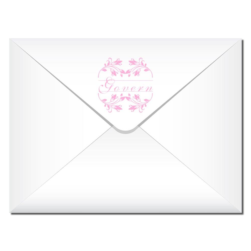 Wedding invitation envelope with pink ornate Forever logo centered, showcasing romantic branding for a keepsake message