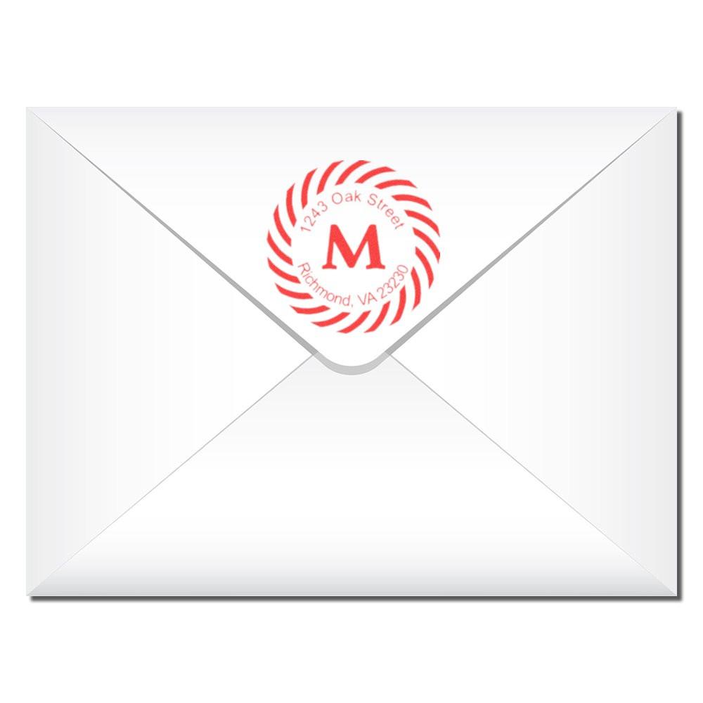 Personalized return address rubber stamp on envelope with monogram M and Richmond, VA mailing address.