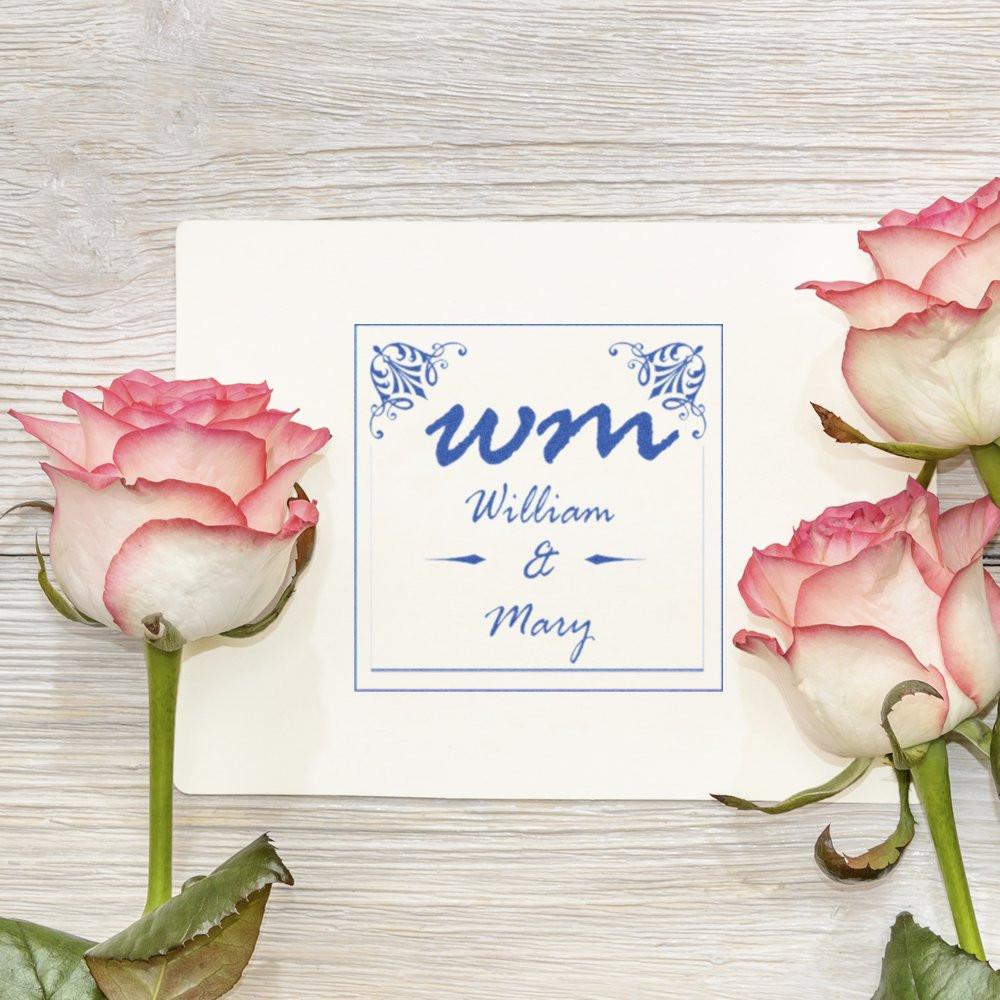 Custom wedding rubber stamp with floral WM monogram for William and Mary, perfect for invitations and stationery.