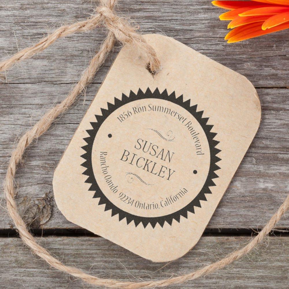 Custom round rubber address stamp on kraft gift tag for personalized packaging, wedding favors, and handmade business branding.