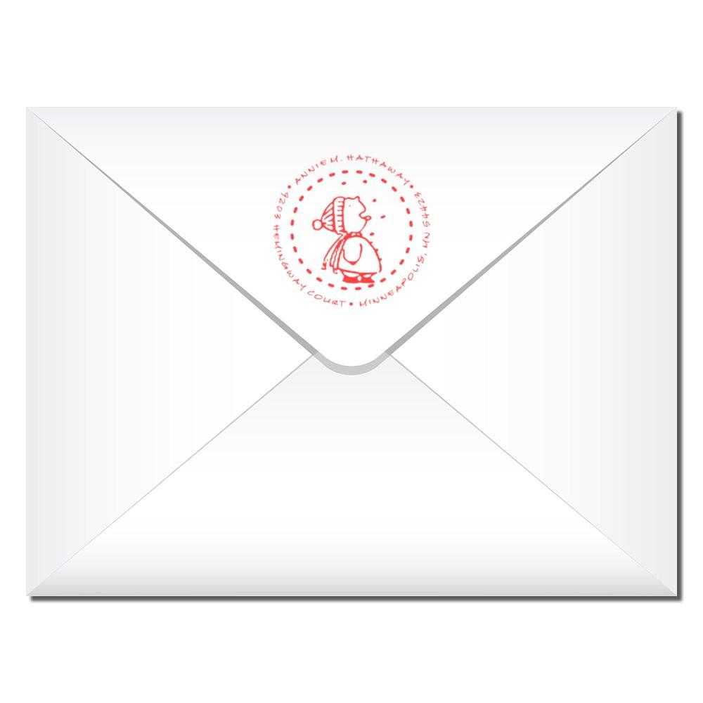Custom rubber stamp logo on white envelope flap for branded mail and return-address use.