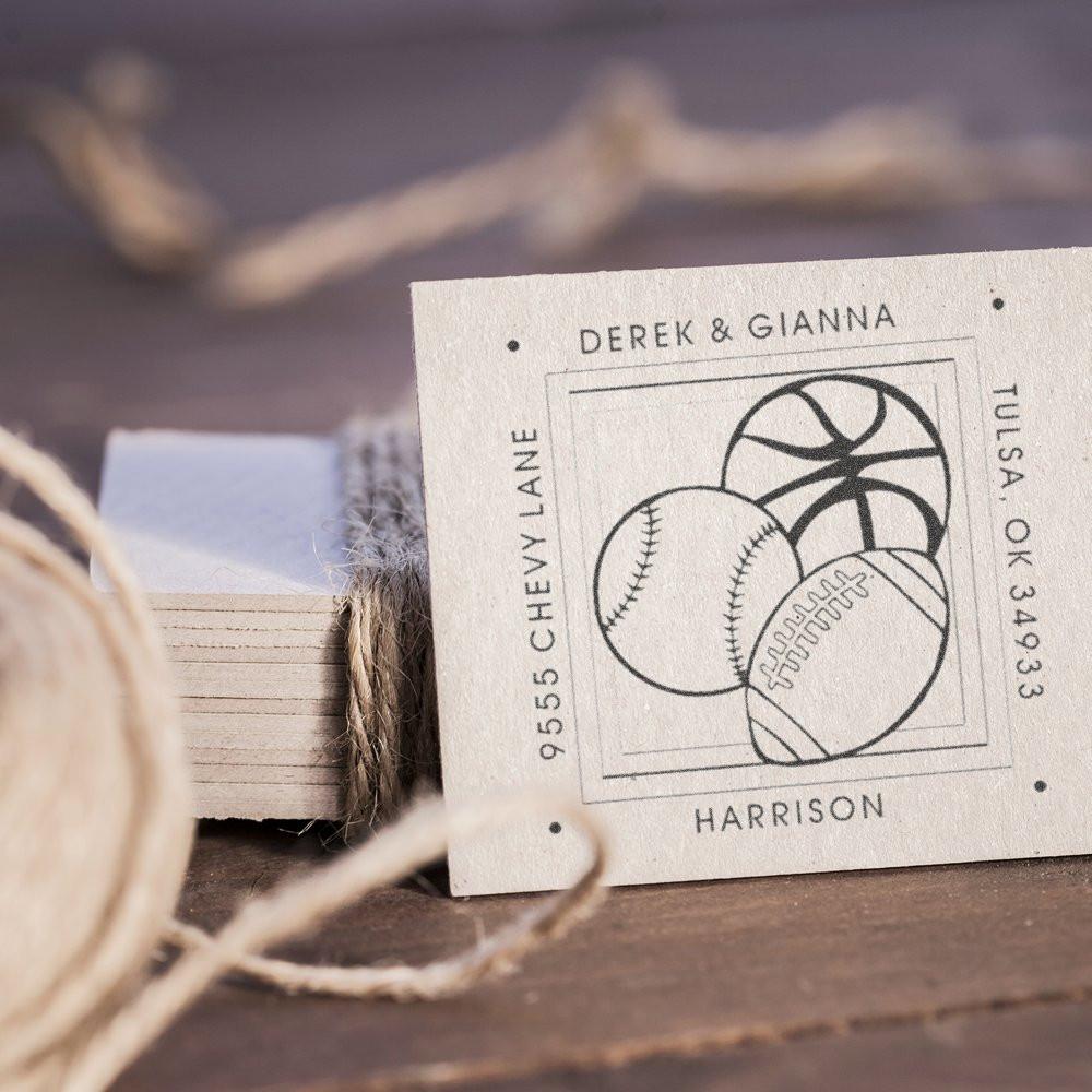 Personalized return address rubber stamp with basketball, baseball and football design for custom family mailings.
