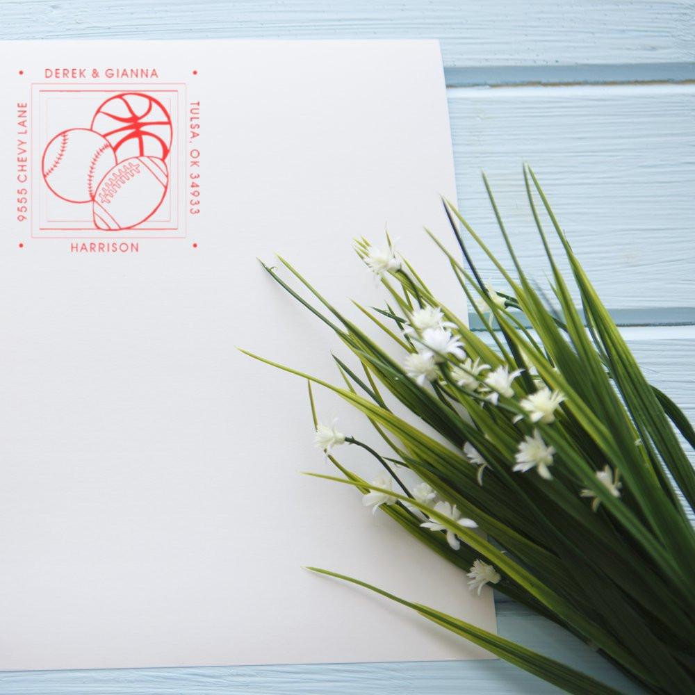 Custom sports-themed return address rubber stamp with basketball, baseball and football design for family stationery.