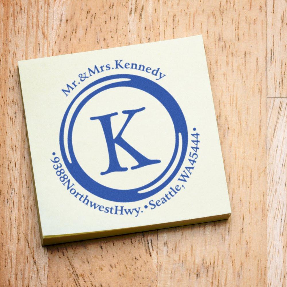 Personalized name tag for Mr. & Mrs. Kennedy with blue monogram K and address Northwest Hwy, Seattle WA 98144.