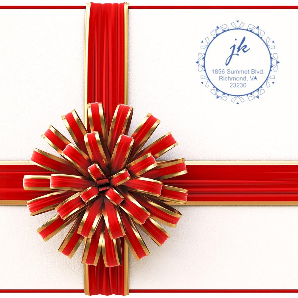 Personalized rubber stamp with logo, initials, and address for branded packaging and correspondence