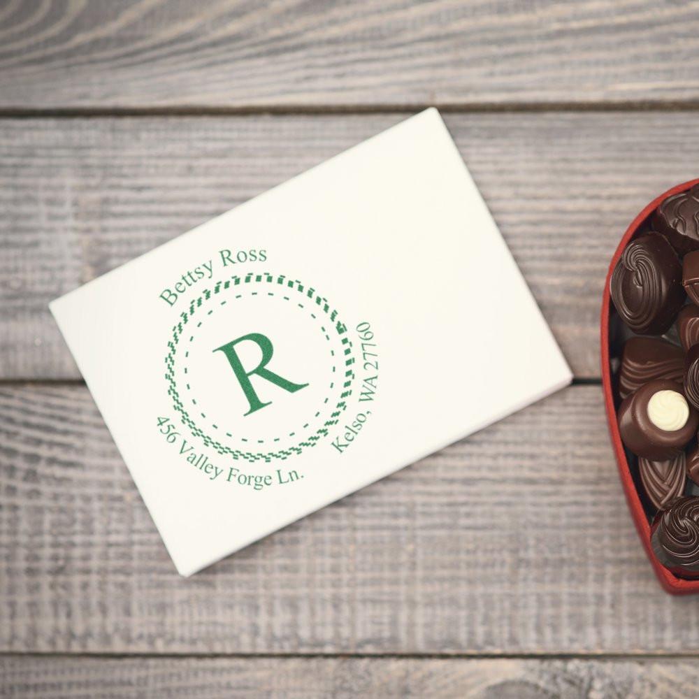 Custom return address rubber stamp with monogram R on envelope for personalized stationery and wedding mailings