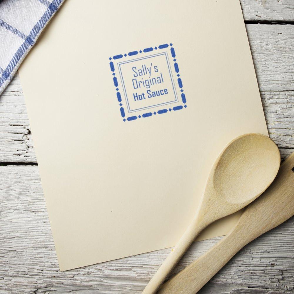 Custom rubber stamp logo impression for Sallys Original Hot Sauce, ideal for branded packaging and product labels.