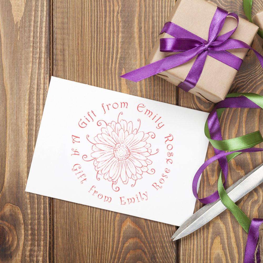 Custom floral rubber stamp with personalized gift message, A Gift from Emily Rose, for wrapping and packaging.