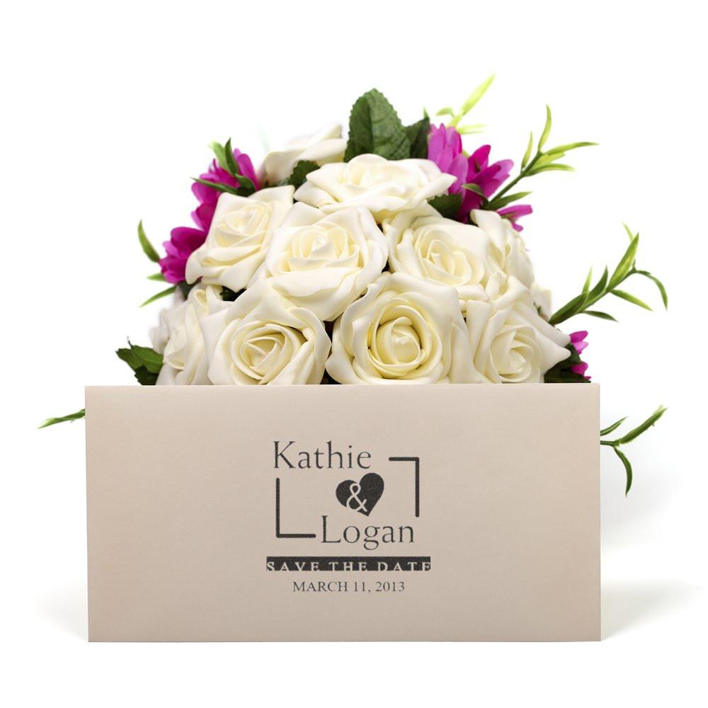 Personalized wedding rubber stamp on a save-the-date card with white rose bouquet for Kathie and Logan.