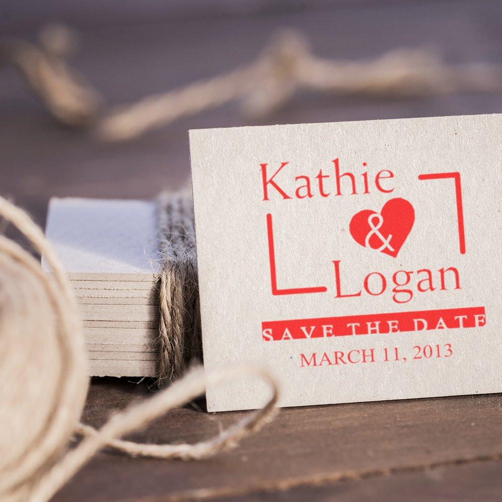 Custom wedding save the date rubber stamp with Kathie and Logan names, heart design, and March 11, 2013 date.