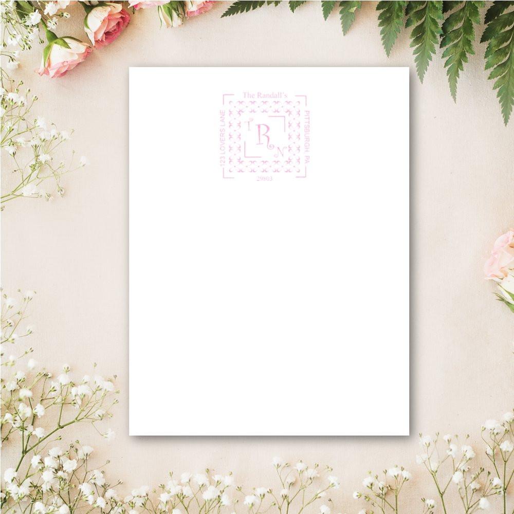 Custom monogram return address rubber stamp impression on white card, ideal for wedding invitations and stationery.