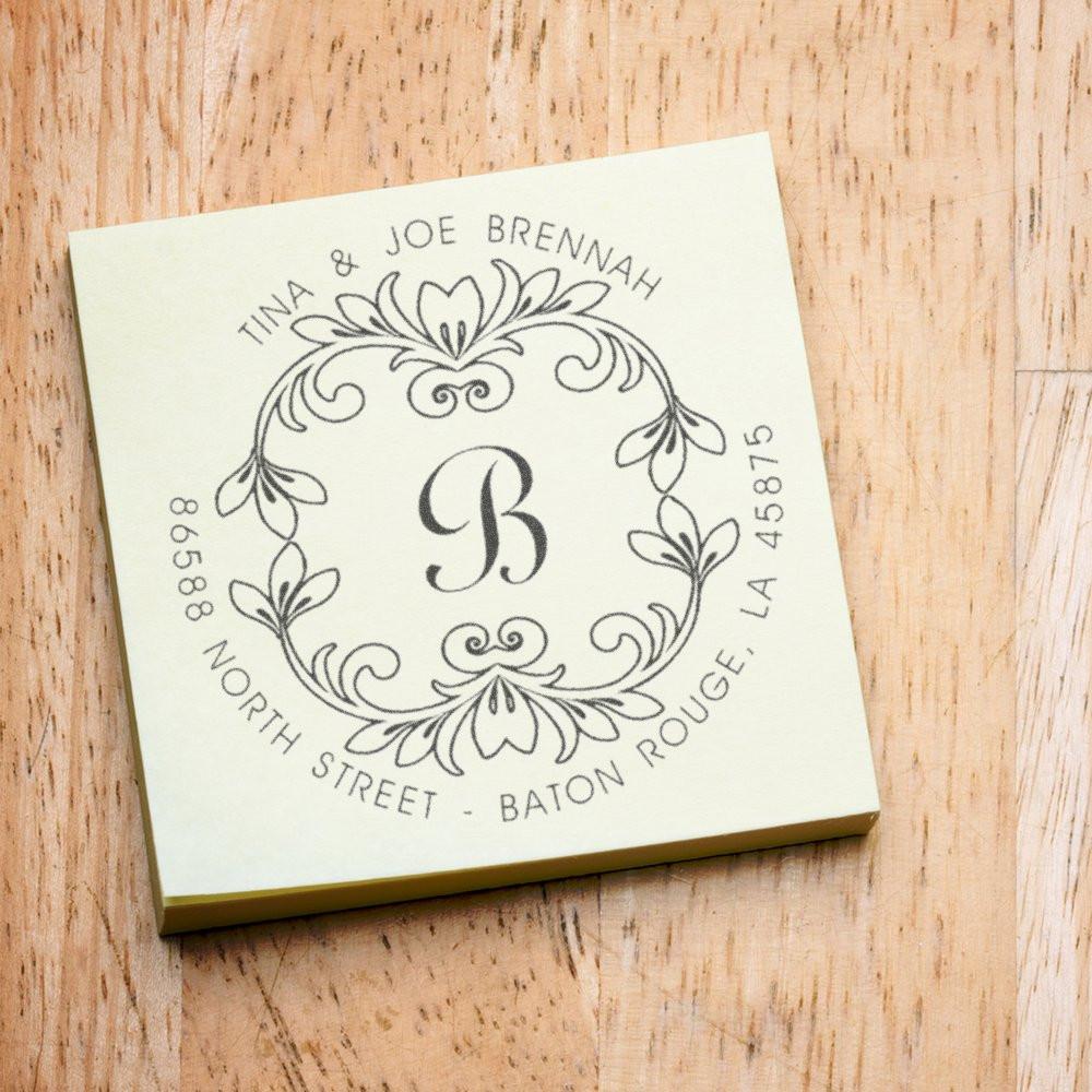 Custom address rubber stamp with monogram B and floral wreath for wedding invitations, featuring Tina & Joe Brennan's return address.