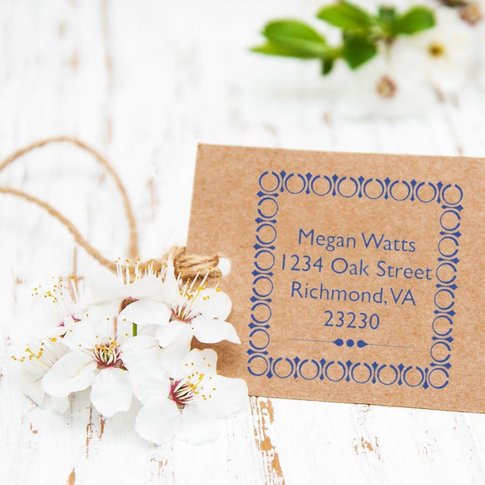 Custom return address rubber stamp on kraft card, perfect for wedding invitations, handmade packaging, and personalized mailings.