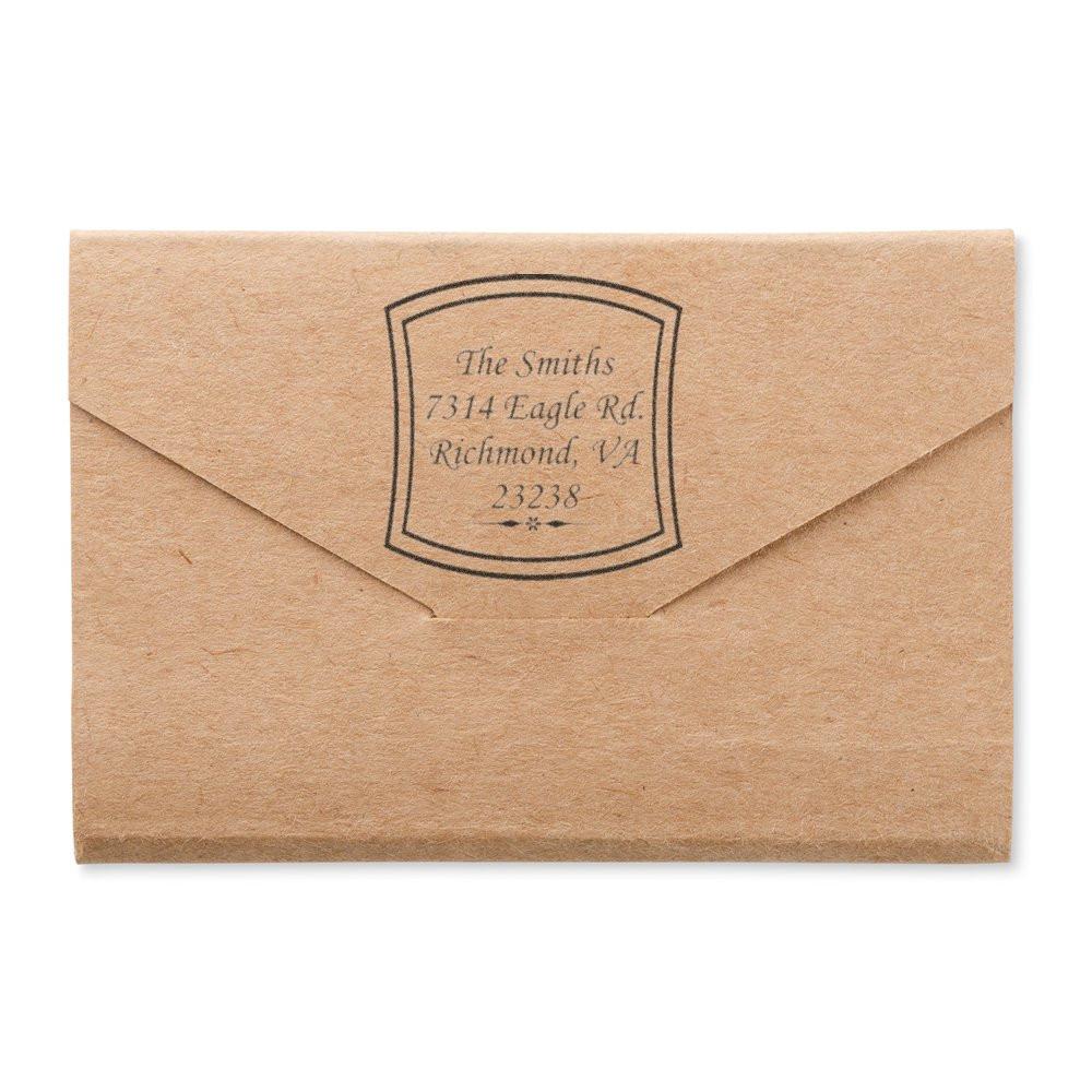 Custom return address rubber stamp on kraft envelope for The Smiths personalized mailing.