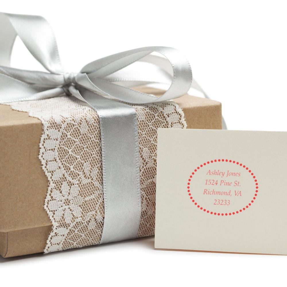 Personalized address rubber stamp on gift card for elegant wedding gift wrapping and custom mailing.