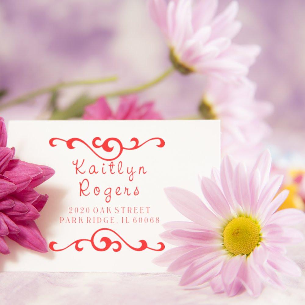 Custom floral return address rubber stamp with name and address for wedding invitations and stationery.