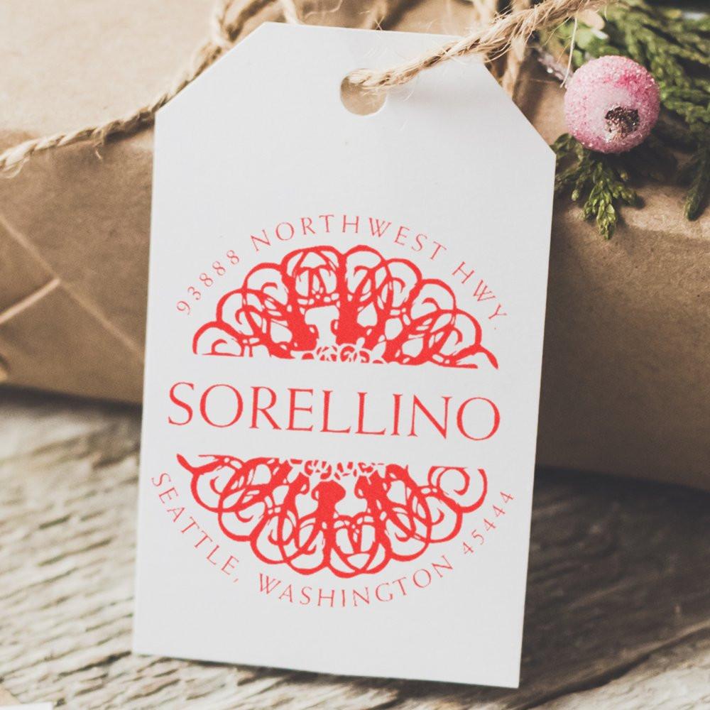 Custom rubber stamp logo on a white gift tag for Sorellino, featuring Northwest Hwy Seattle, Washington branding.