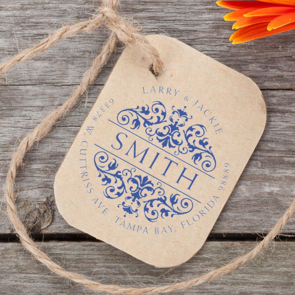Custom rubber stamp with Smith family return address design on kraft tag, ideal for wedding invitations and packaging.