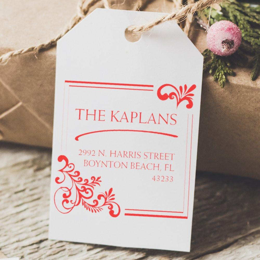 Personalized family address rubber stamp on white gift tag, featuring The Kaplans name and Boynton Beach address.