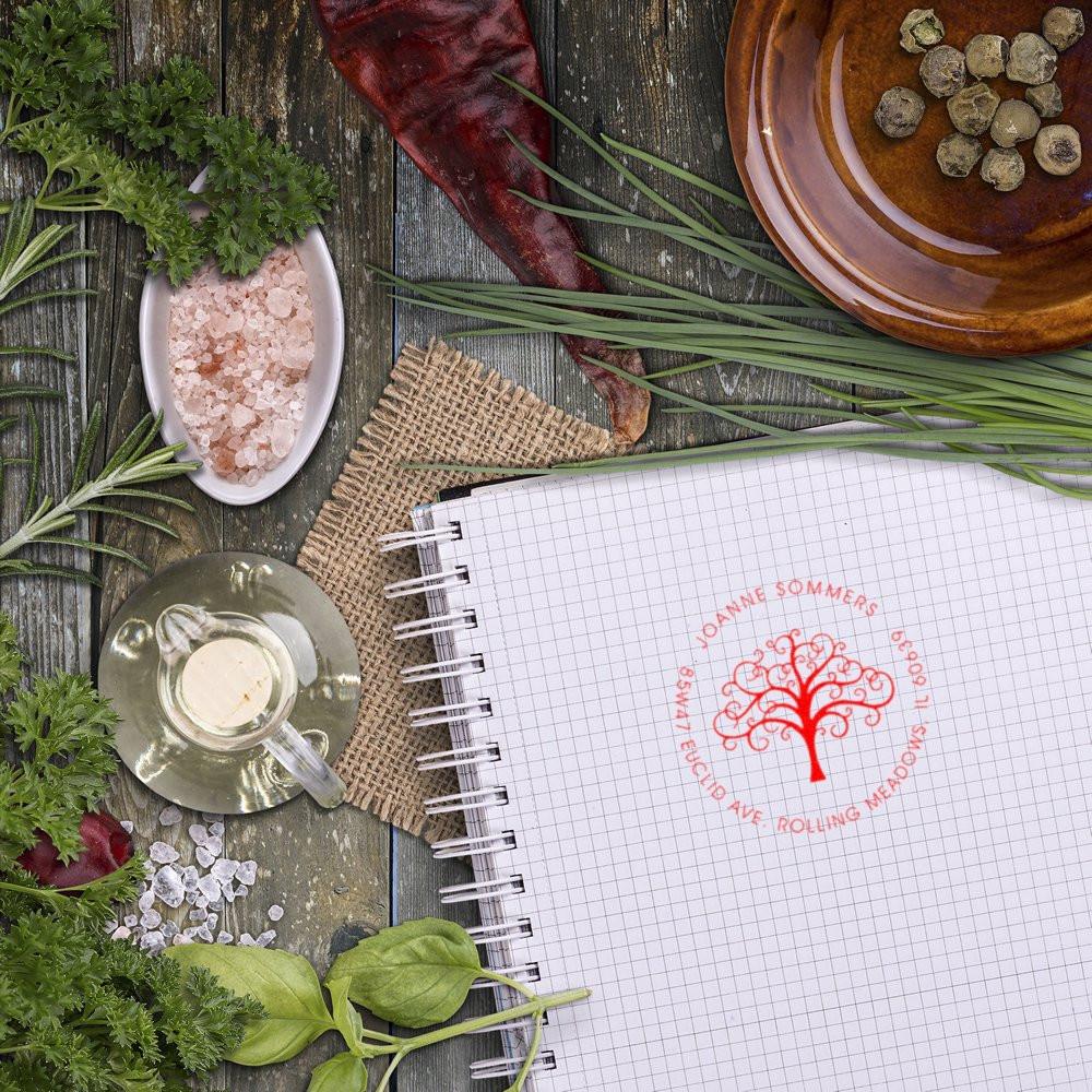 Herbal spa flat lay with salt, candle, and branded notebook on rustic wood for natural wellness branding.