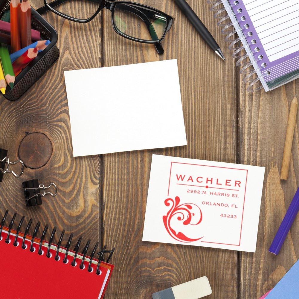 Custom rubber address stamp on stationery, showing a logo imprint for professional business branding, envelopes, and mailing.