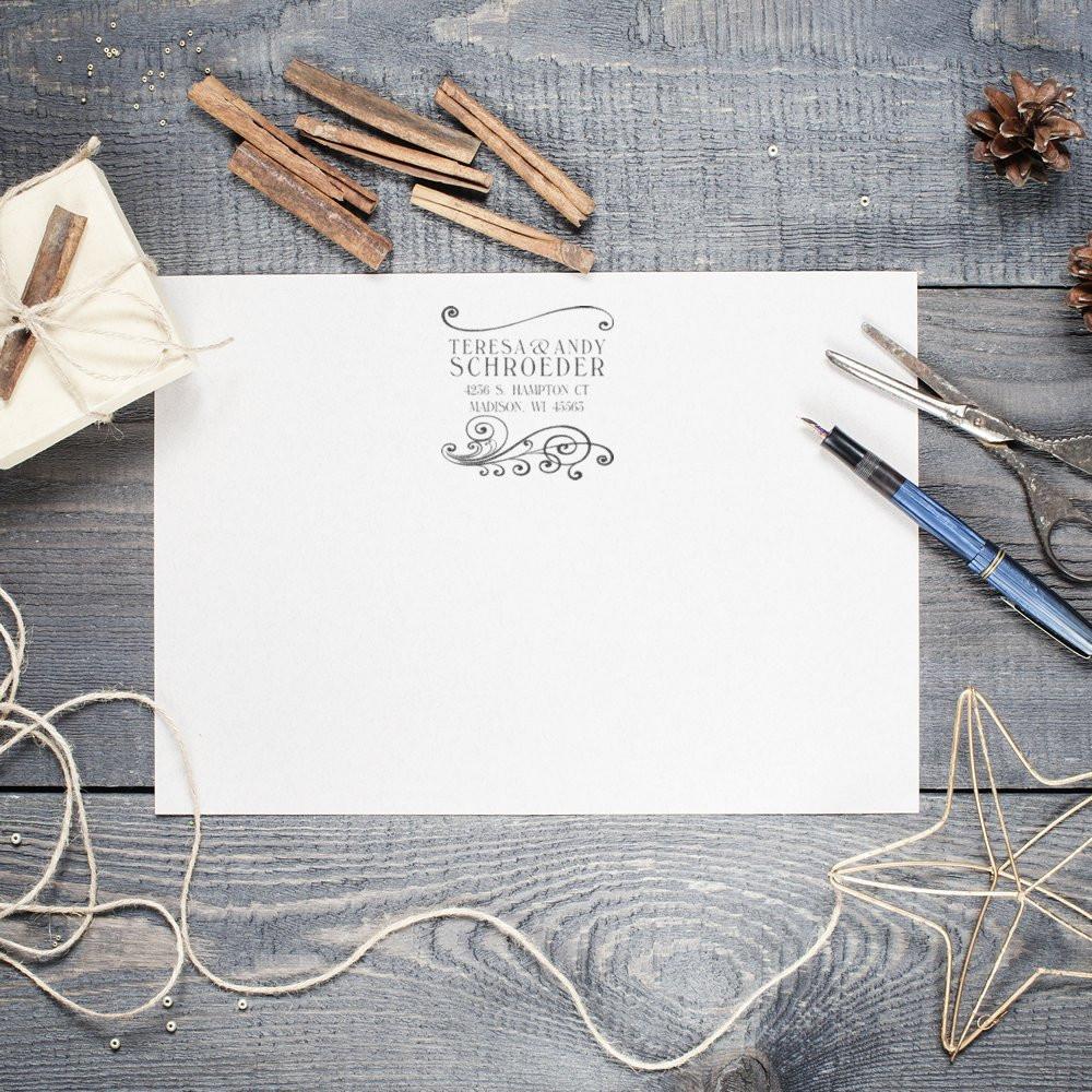 Custom return address rubber stamp imprint on stationery, perfect for personalized wedding invitations and mailing.