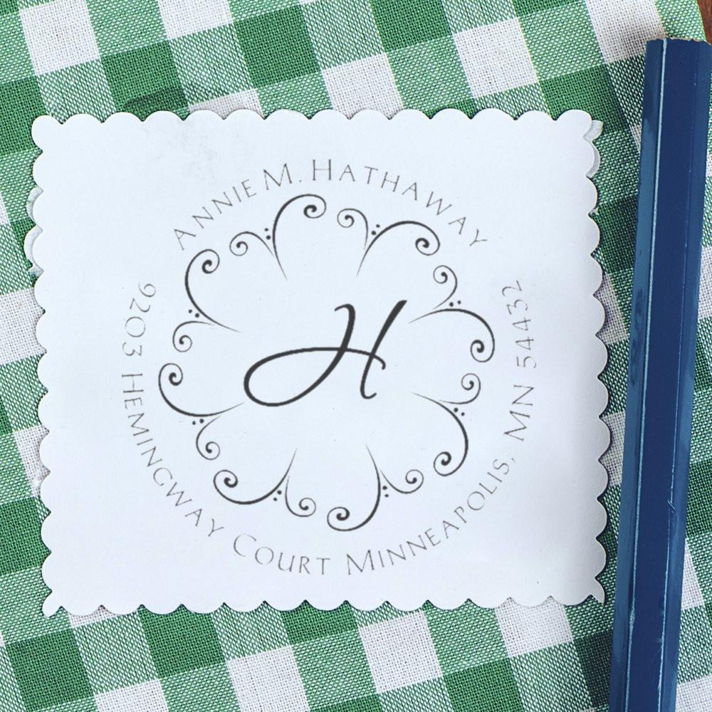 Custom return address rubber stamp with monogram H and floral border for Annie M. Hathaway, Minneapolis, MN.