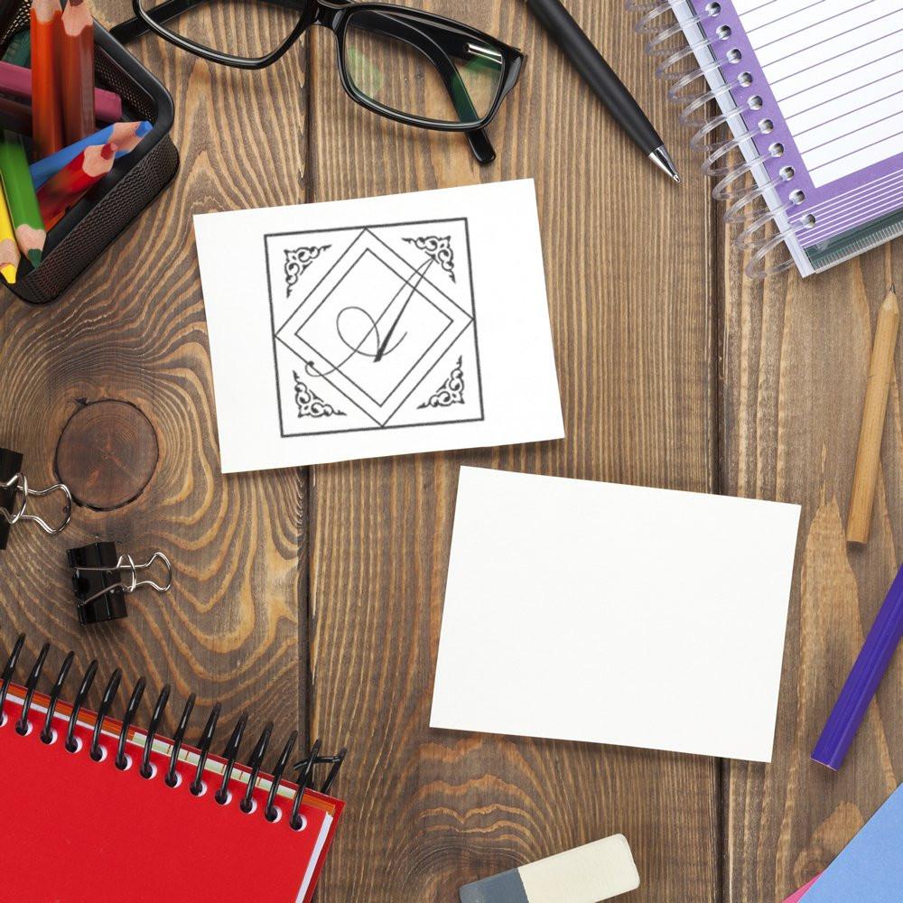 Custom rubber stamp impression on a blank card, styled for business branding, packaging, and office stationery.