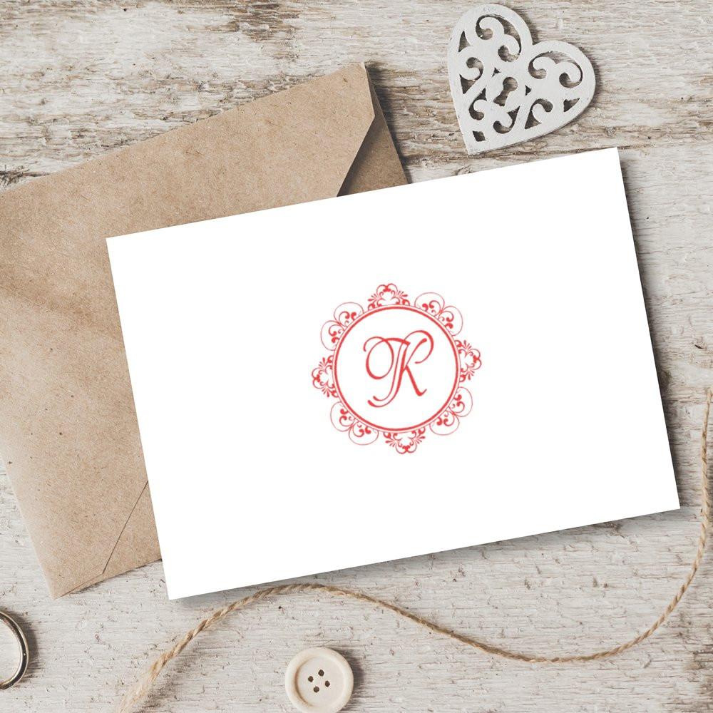 Personalized monogram rubber stamp impression with ornate K for wedding invitations, envelopes, and handmade stationery.