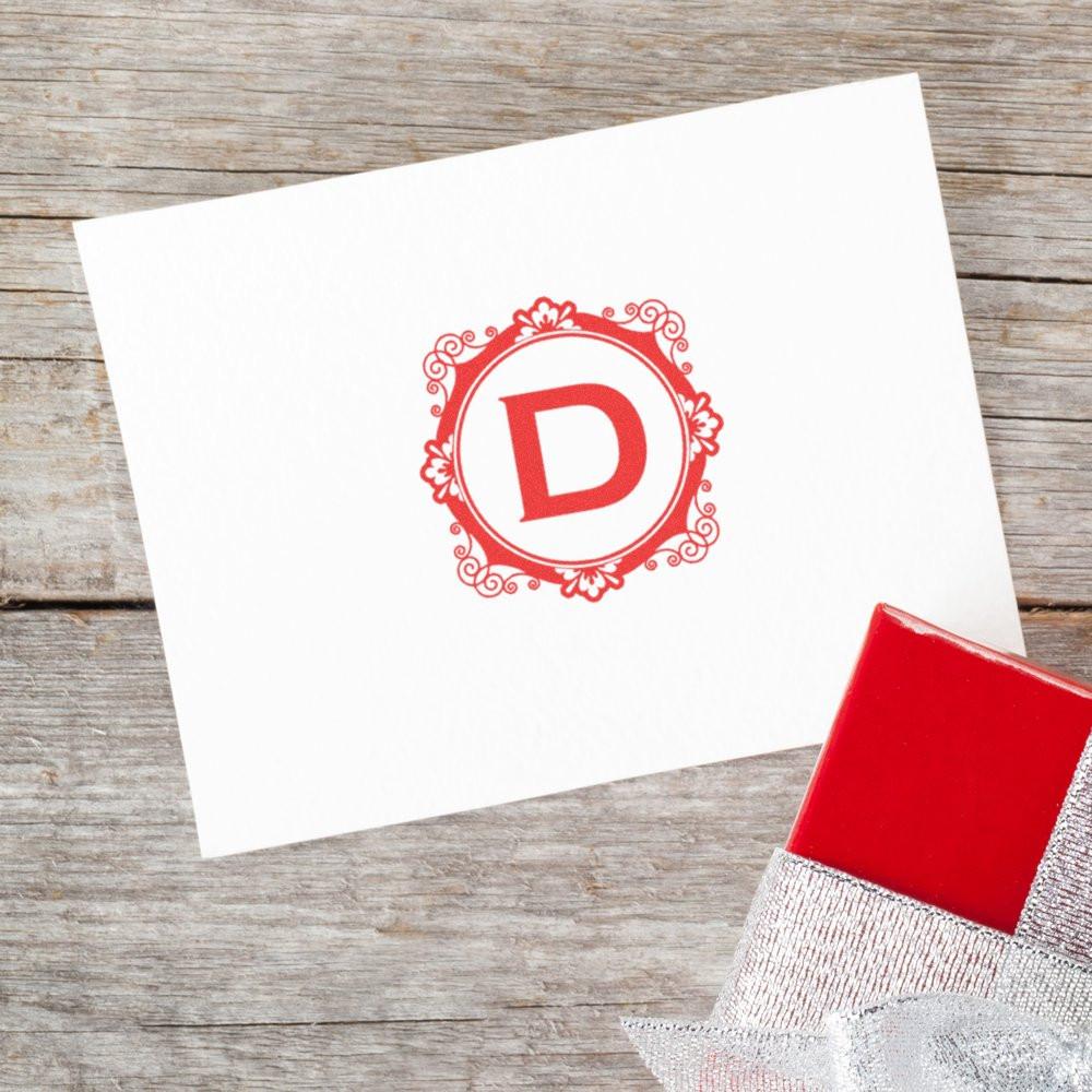 Decorative custom rubber stamp with letter D monogram for personalized stationery, packaging, and gift branding.